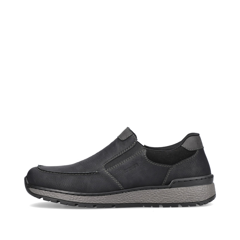 
Tiefschwarze Rieker Herren Slipper B9062-00 mit einer schockabsorbierenden Sohle. Schuh Außenseite