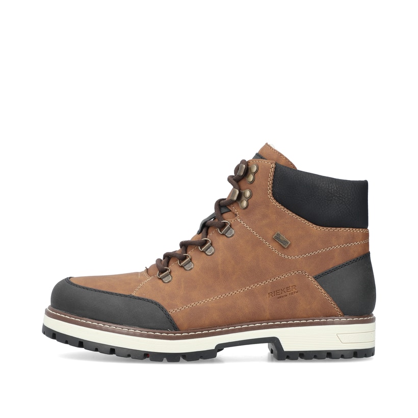 
Hellbraune Rieker Herren Schnürstiefel F8302-24 mit einer Flip-Grip Sohle mit Spikes. Schuh Außenseite