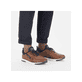 
Mokkabraune Rieker Herren Slipper B2051-24 mit Elastikeinsatz sowie einer Profilsohle. Schuh am Fuß