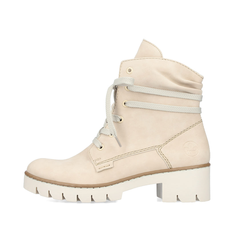 
Hellbeige Rieker Damen Schnürstiefel X5717-62 mit einer Profilsohle mit Blockabsatz. Schuh Außenseite