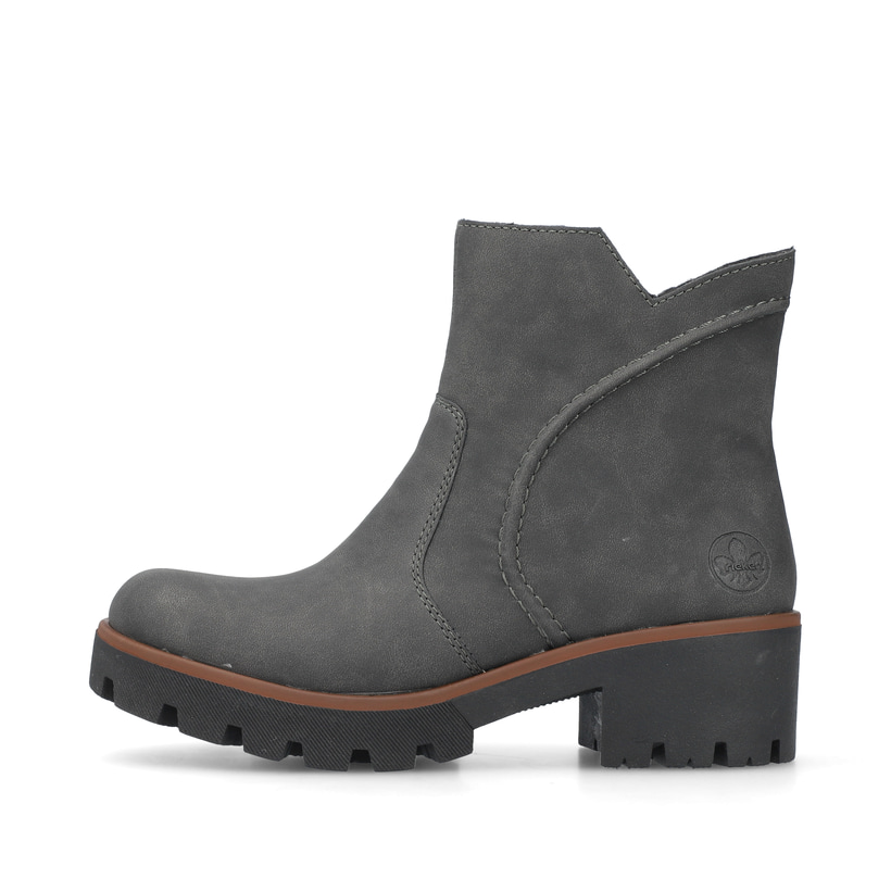 
Braungraue Rieker Damen Kurzstiefel 79261-45 mit einer Profilsohle mit Blockabsatz. Schuh Außenseite