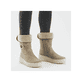 Beige Rieker Damen Kurzstiefel N2554-60 mit Schaftkragen sowie Reißverschluss. Schuh am Fuß.