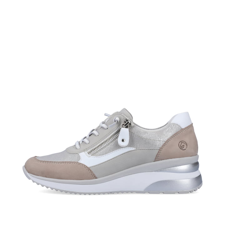 
Platingraue remonte Damen Sneaker D2410-40 mit einer flexiblen Sohle mit Keilabsatz. Schuh Außenseite